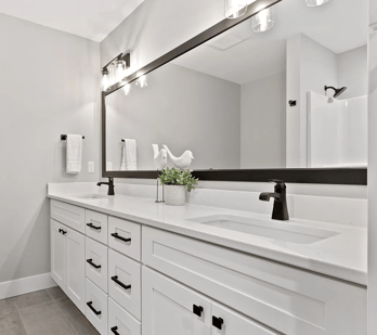 Bathroom with white shaker cabinets