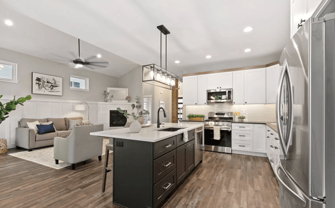 kitchens with vinyl plank flooring and shaker cabinets