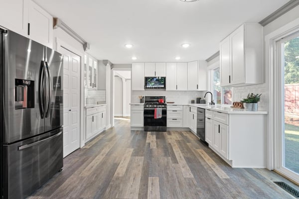 Kitchen with shaker cabinets & vinyl plank flooring Kitchen with shaker cabinets & vinyl plank flooring
