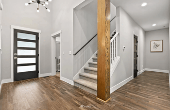 hall with vinyl plank flooring