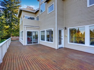 Two-Story-House-With-Wooden-Wa-143111315